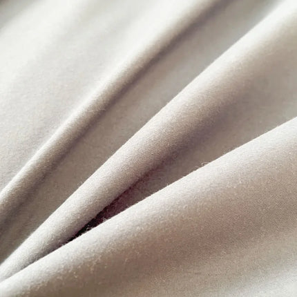 Okeywow solid color brushed fabric bedding set with duvet cover and pillowcases in a cozy, soft texture for single, queen, or king beds.