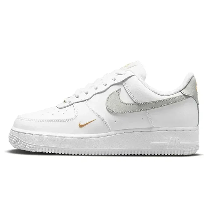 Nike Air Force 1 Low Skateboarding Shoes: Comfortable unisex sneakers available for both men and women. Classic white and black design for versatile style.