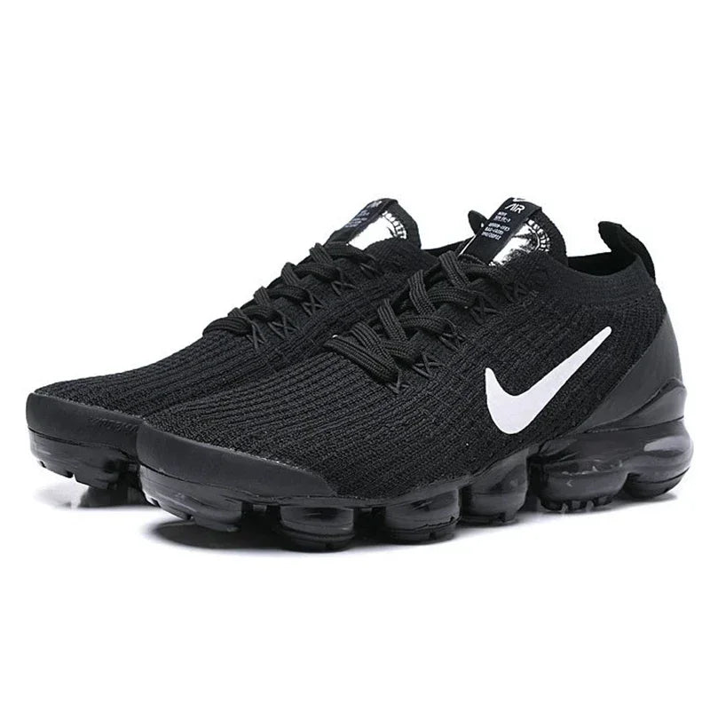 Original Nike Air VaporMax 3.0 2019: Featuring atmospheric cushioning, these wild jogging shoes are available in Women's sizes 36-39. Black and white colorway with hook design (AJ6900-001).