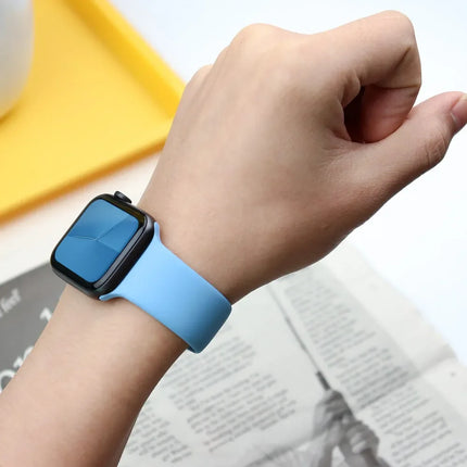 OKEYWOW Apple Watch silicone sport band for Series 9, Ultra, SE, and 3 in 38mm to 49mm sizes, showing a black strap on a smartwatch.